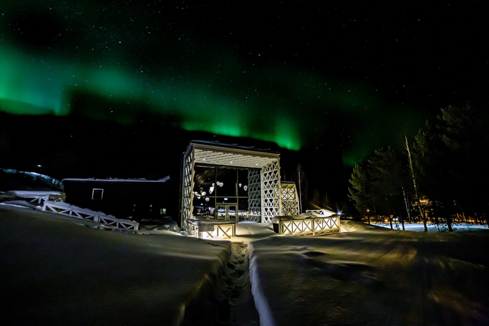 Rakas Restaurant with Northern Lights in Rovaniemi Finland.